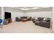 Finished basement with entertainment space and lounge at 816 Blackfoot Trl, Suwanee, GA 30024