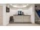 Basement features a stylish bar area and a basketball game at 816 Blackfoot Trl, Suwanee, GA 30024