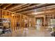 Spacious unfinished basement, featuring exposed ceiling and stud walls, ready for personalization and renovation at 816 Blackfoot Trl, Suwanee, GA 30024