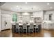 Gourmet kitchen boasts a large island, custom cabinets, and stainless steel appliances at 816 Blackfoot Trl, Suwanee, GA 30024