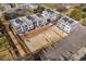 Aerial view of a new townhome construction site in a neighborhood with surrounding trees at 1237 Memorial Se Dr # 303, Atlanta, GA 30316