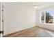 Bright bedroom with hardwood floors and a large window offering natural light and outdoor views at 1237 Memorial Se Dr # 303, Atlanta, GA 30316