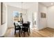 Bright dining room with hardwood floors and views of the neighborhood at 1237 Memorial Se Dr # 303, Atlanta, GA 30316