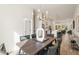 Open-concept dining room with contemporary decor, hardwood floors, and access to kitchen at 1237 Memorial Se Dr # 303, Atlanta, GA 30316