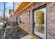 Charming brick front entrance with a modern door and stylish address numbers, enhancing curb appeal at 1237 Memorial Se Dr # 303, Atlanta, GA 30316