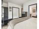 Spacious bedroom featuring a large closet, modern desk and access to the bathroom at 1300 Dekalb Ne Ave # 711, Atlanta, GA 30307