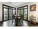 Bright dining room with expansive windows and a decorative wall art at 1300 Dekalb Ne Ave # 711, Atlanta, GA 30307