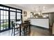 Dining area with large windows and stainless steel kitchen appliances at 1300 Dekalb Ne Ave # 711, Atlanta, GA 30307