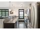 Modern kitchen with stainless steel appliances, pendant lighting, and eat in counter at 1300 Dekalb Ne Ave # 711, Atlanta, GA 30307