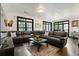 Living room with dark hardwood floors and large windows with lots of natural light at 1300 Dekalb Ne Ave # 711, Atlanta, GA 30307