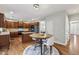 Spacious kitchen with hardwood floors, an island, and ample cabinet space, ideal for entertaining at 3395 The Commons Dr, Cumming, GA 30041