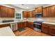 Well-equipped kitchen featuring stainless steel appliances, custom cabinets, and ample counter space at 3395 The Commons Dr, Cumming, GA 30041