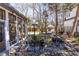 Charming backyard featuring a decorative fountain, a gazebo, and lush landscaping perfect for relaxation at 4210 Gatewood Ln, Peachtree Corners, GA 30097