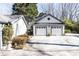 Detached two-car garage showcasing ample parking space and well-maintained exterior at 4210 Gatewood Ln, Peachtree Corners, GA 30097