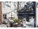 Exterior view showcasing the Gatewood Lane sign, elegant landscaping, and charming home facade at 4210 Gatewood Ln, Peachtree Corners, GA 30097