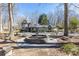 Charming water fountain in the front lawn of this beautiful Tudor-style home at 4210 Gatewood Ln, Peachtree Corners, GA 30097