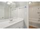 Bright bathroom featuring neutral walls, a sink, and a tub at 484 Culberson Sw St, Atlanta, GA 30310