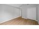 Bright bedroom features a large closet, vaulted ceiling, and hardwood floors at 484 Culberson Sw St, Atlanta, GA 30310