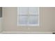 Bedroom features window and tile flooring at 484 Culberson Sw St, Atlanta, GA 30310