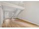 Spacious entryway featuring sleek flooring, ample natural light, and an open staircase to the second level at 484 Culberson Sw St, Atlanta, GA 30310