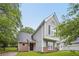 Charming two-story home features brick accents, a well-maintained lawn, and a classic architectural design at 484 Culberson Sw St, Atlanta, GA 30310