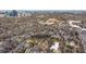 City skyline view overlooking a neighborhood with mature trees near educational institutions in Atlanta at 513 Saint Charles Ne Ave, Atlanta, GA 30308