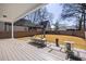 Large backyard with a spacious deck, dining area and privacy fence at 513 Saint Charles Ne Ave, Atlanta, GA 30308