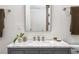 Modern bathroom vanity with marble countertop, gray cabinet and brushed nickel faucet at 513 Saint Charles Ne Ave, Atlanta, GA 30308