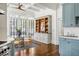 Bright breakfast nook with coffered ceiling, large windows, built-in cabinets, and seating for four at 513 Saint Charles Ne Ave, Atlanta, GA 30308