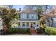 Charming two-story home with a classic front porch, offering an inviting and picturesque setting at 513 Saint Charles Ne Ave, Atlanta, GA 30308