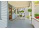 Charming front porch features rocking chairs and an inviting space to relax outdoors at 513 Saint Charles Ne Ave, Atlanta, GA 30308