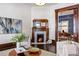 Charming living room featuring a fireplace with a decorative mantel, hardwood floors, and stylish decor at 513 Saint Charles Ne Ave, Atlanta, GA 30308