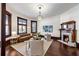 Bright living room features hardwood floors, a fireplace, modern furniture, and plentiful natural light at 513 Saint Charles Ne Ave, Atlanta, GA 30308