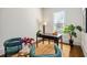 Bright office space with lots of natural light, hardwood floors and area rug at 513 Saint Charles Ne Ave, Atlanta, GA 30308
