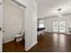 Open living area with modern lighting, a breakfast bar, and French doors that lead to the outside at 105 Arbor Creek Trl, Dallas, GA 30157