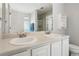 Large bathroom with double sinks, vanity, and spacious mirror, along with a toilet at 3698 Roseman Lndg, Cumming, GA 30040