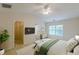 Serene main bedroom boasts a vaulted ceiling, walk-in closet, and natural light from the large windows at 768 Nehemiah Sw Ln, Atlanta, GA 30331