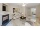 Inviting living room featuring a fireplace, neutral decor, and an open floor plan that is perfect for entertaining at 768 Nehemiah Sw Ln, Atlanta, GA 30331
