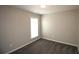 Comfortable carpeted bedroom with neutral walls, a window, and recessed lighting at 942 Idlewood Dr, Canton, GA 30115