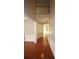 Bright foyer with hardwood floors, high ceilings, and decorative molding welcomes you into the home at 942 Idlewood Dr, Canton, GA 30115
