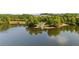 Scenic lake view featuring a charming gazebo on a small island at 942 Idlewood Dr, Canton, GA 30115