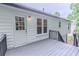 Spacious gray back deck with direct access to the home's interior at 159 Aztec Se Way, Acworth, GA 30102