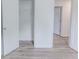 A bedroom features durable hardwood floors, neutral paint, and closet at 159 Aztec Se Way, Acworth, GA 30102