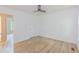 Well-lit bedroom with wood-look flooring and a ceiling fan at 159 Aztec Se Way, Acworth, GA 30102