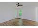 Sunlit bedroom offers neutral paint and views of the outdoors at 159 Aztec Se Way, Acworth, GA 30102