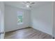 Bedroom featuring vinyl flooring and a window view at 159 Aztec Se Way, Acworth, GA 30102