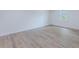 Bright bedroom showcasing durable flooring and a large window at 159 Aztec Se Way, Acworth, GA 30102