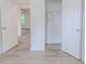 A bedroom featuring durable hardwood floors, neutral paint, and closet at 159 Aztec Se Way, Acworth, GA 30102