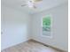 Light-filled bedroom features neutral walls and a ceiling fan at 159 Aztec Se Way, Acworth, GA 30102