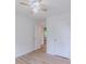 A bright bedroom featuring durable hardwood floors, neutral paint, and closet at 159 Aztec Se Way, Acworth, GA 30102